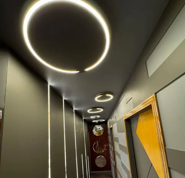 New Hair Image corridor with ring lights and a gold logo mirror